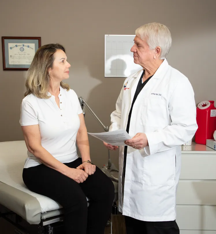 Dr. Earl with patient